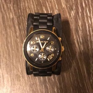 Black and gold Michael kors watch